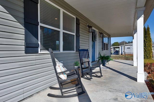 view of patio featuring covered porch