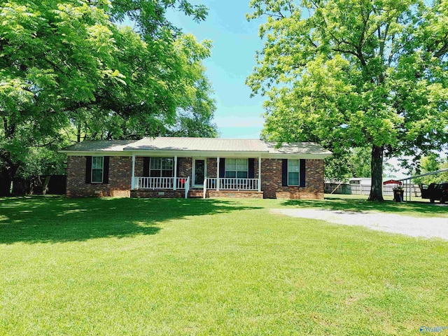 ranch-style house featuring a front yard and a porch