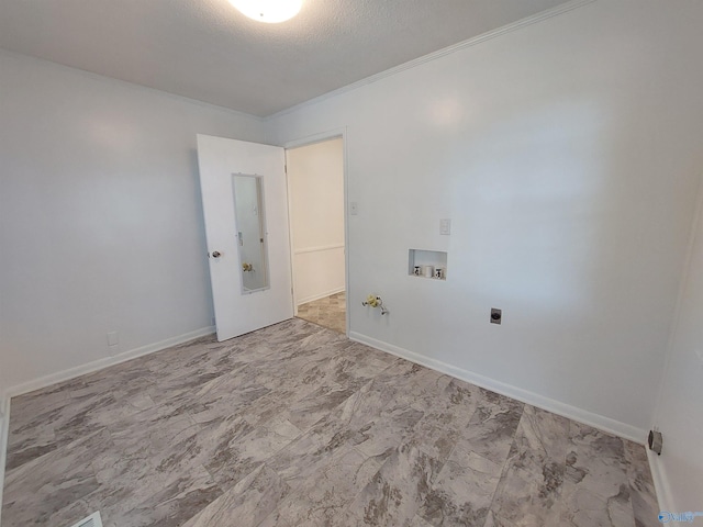 laundry room featuring gas dryer hookup, hookup for a washing machine, a textured ceiling, and electric dryer hookup