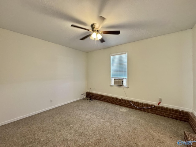 carpeted empty room with ceiling fan and cooling unit