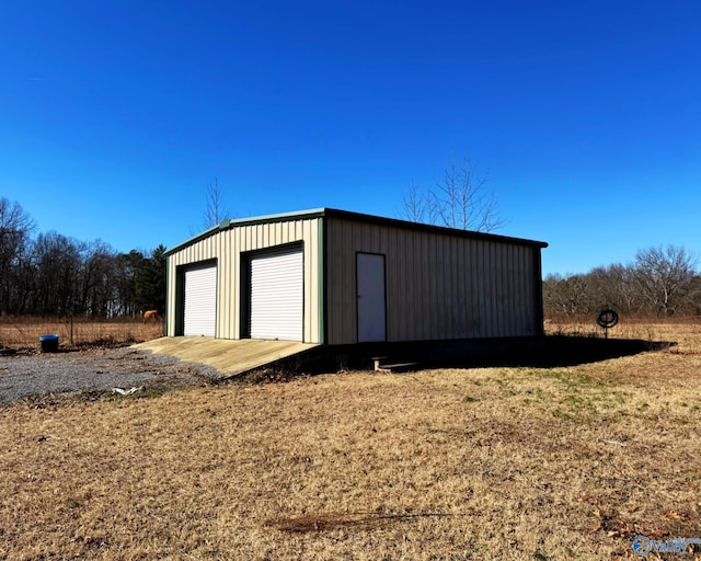 view of outbuilding featuring a garage