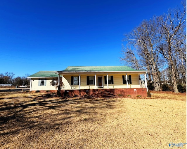 ranch-style home featuring covered porch