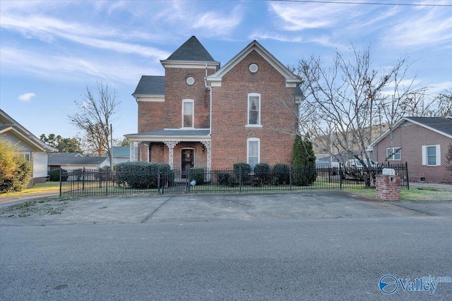 104 Myrtle Pl, Stevenson, AL 35772 - view of front of property featuring brick siding and a fenced front yard