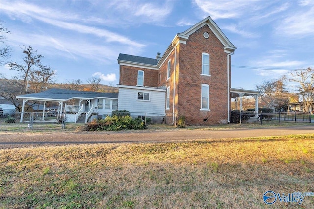 104 Myrtle Pl, Stevenson, AL 35772 - view of side of property featuring brick siding and a porch