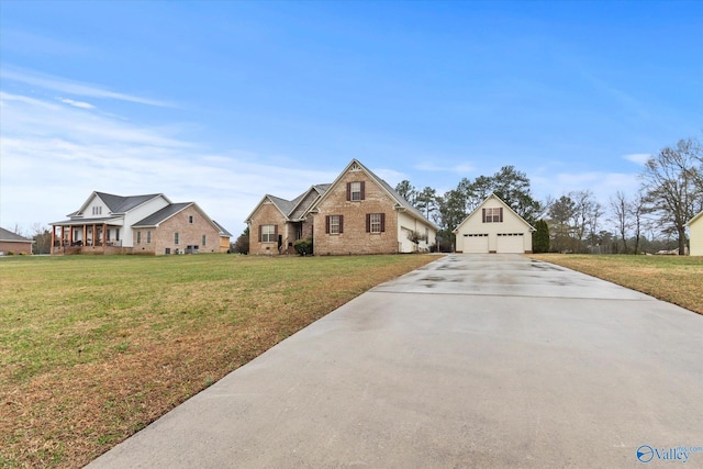 view of front of house featuring a garage and a front yard