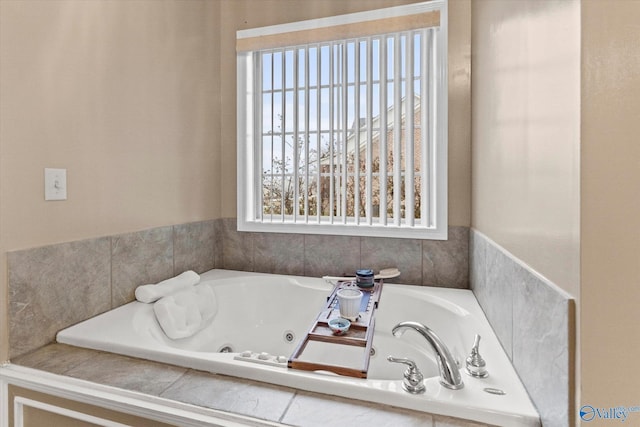 bathroom with tiled bath