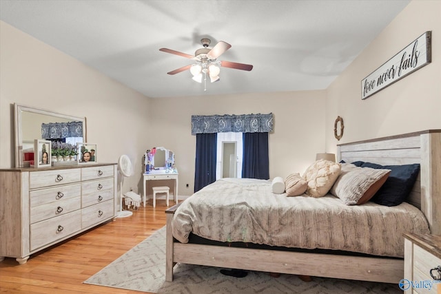 bedroom featuring ceiling fan and light wood-type flooring