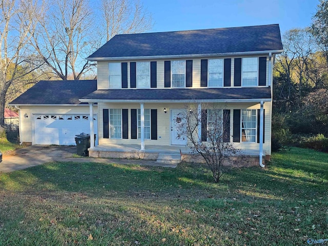 view of front of property with a porch, a garage, and a front lawn