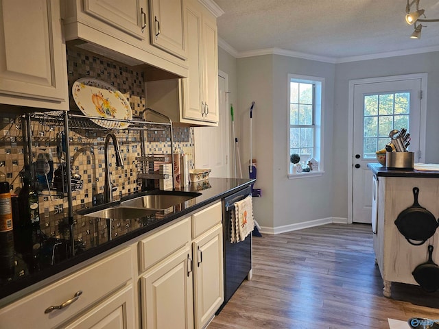 kitchen featuring white cabinetry, sink, dishwasher, dark wood-type flooring, and a textured ceiling