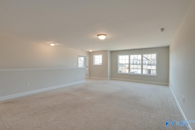 view of carpeted spare room