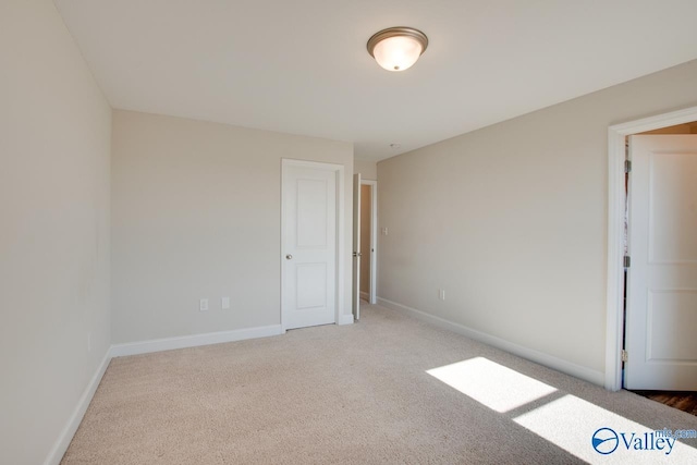 unfurnished bedroom featuring carpet