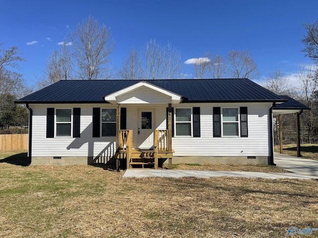 221 Maple Ave, Boaz, AL 35957 - view of front of property with metal roof, fence, a front yard, and crawl space