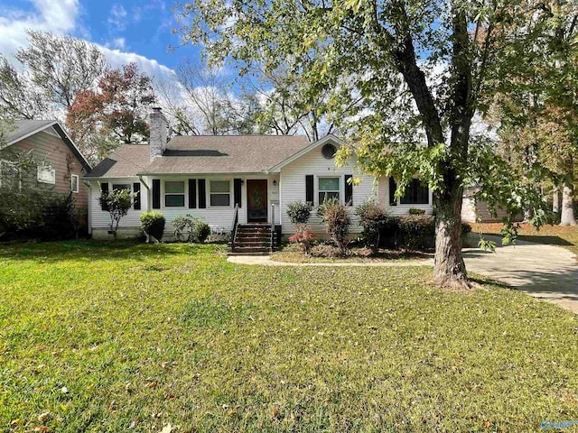 ranch-style home with a front yard