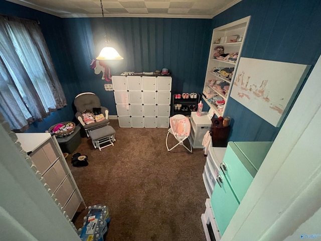 carpeted bedroom featuring crown molding