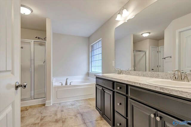 bathroom with vanity, separate shower and tub, and tile patterned floors