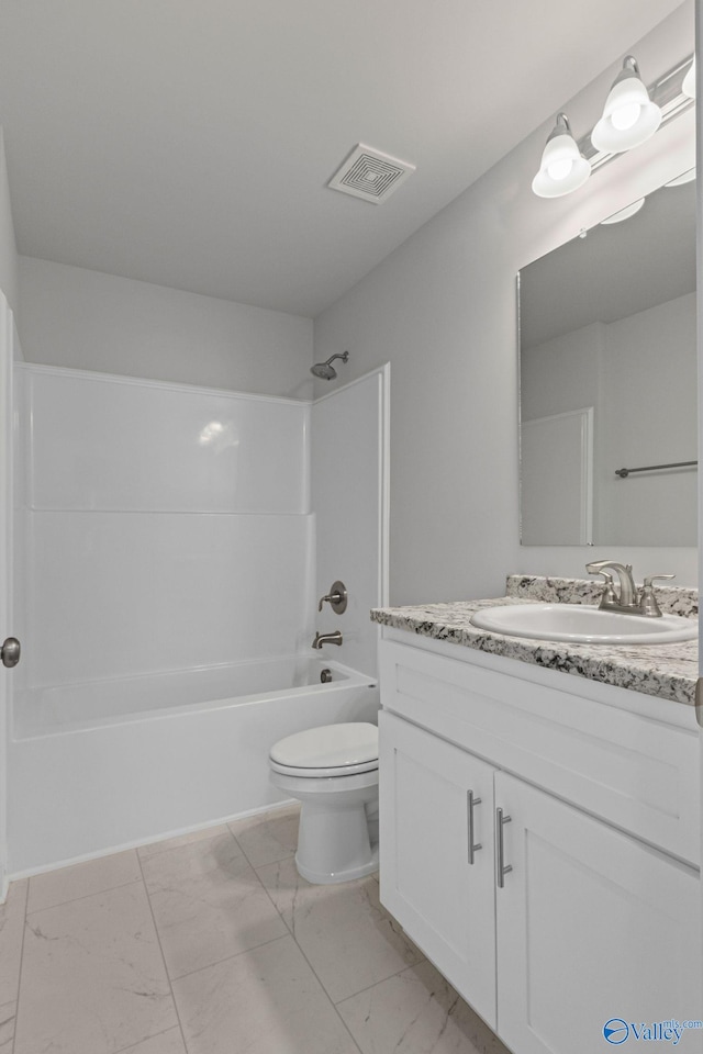 full bath featuring bathtub / shower combination, toilet, visible vents, vanity, and marble finish floor