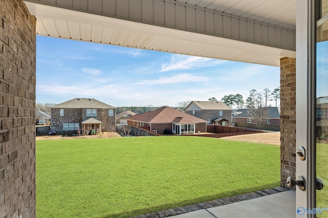 view of yard with a residential view