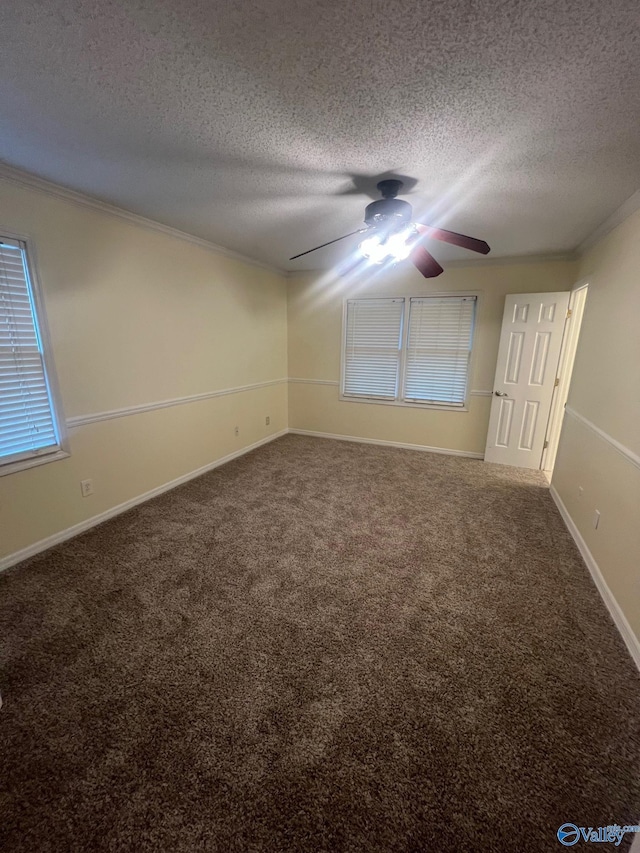 113 Suffolk Dr, Madison, AL 35757 - carpeted spare room with a textured ceiling, ceiling fan, crown molding, and baseboards