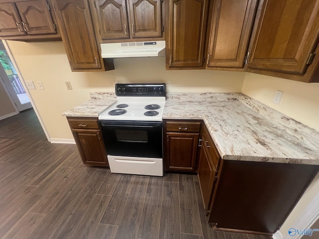 113 Suffolk Dr, Madison, AL 35757 - kitchen with electric range, under cabinet range hood, dark wood-style flooring, and baseboards