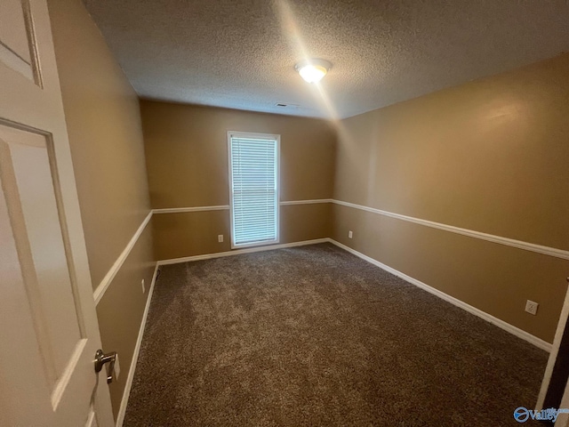 113 Suffolk Dr, Madison, AL 35757 - unfurnished room featuring a textured ceiling, carpet floors, and baseboards