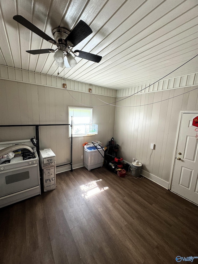 additional living space featuring dark hardwood / wood-style flooring and ceiling fan