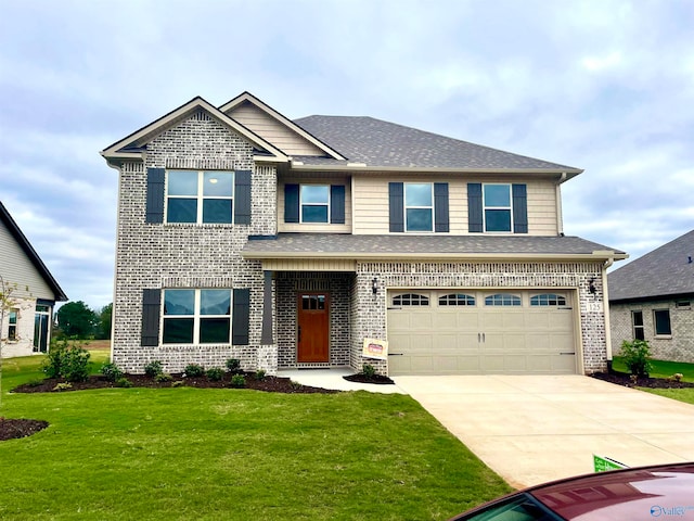 view of front of house with a garage and a front yard