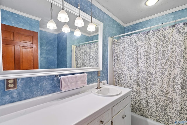 bathroom featuring shower / tub combo with curtain, ornamental molding, vanity, and wallpapered walls