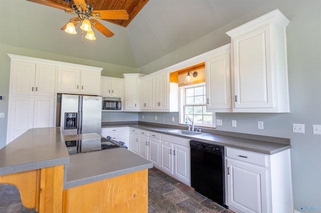 kitchen with sink, black appliances, a kitchen island, ceiling fan, and white cabinets