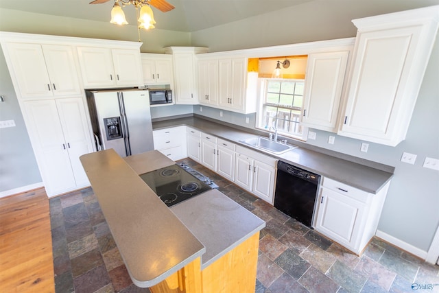 kitchen with white cabinetry, ceiling fan, sink, and black appliances