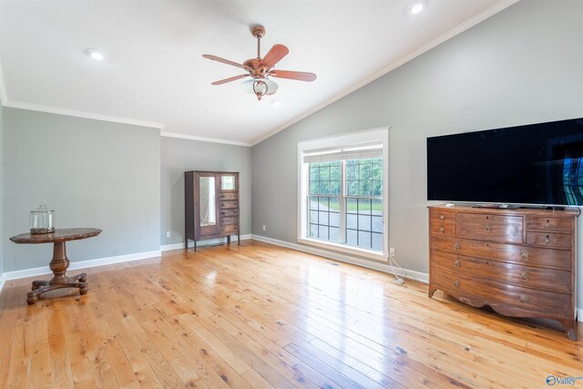 unfurnished living room with lofted ceiling, ornamental molding, light hardwood / wood-style floors, and ceiling fan