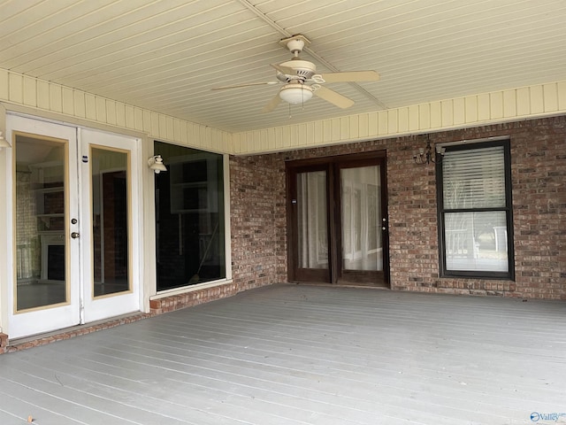 exterior space featuring ceiling fan