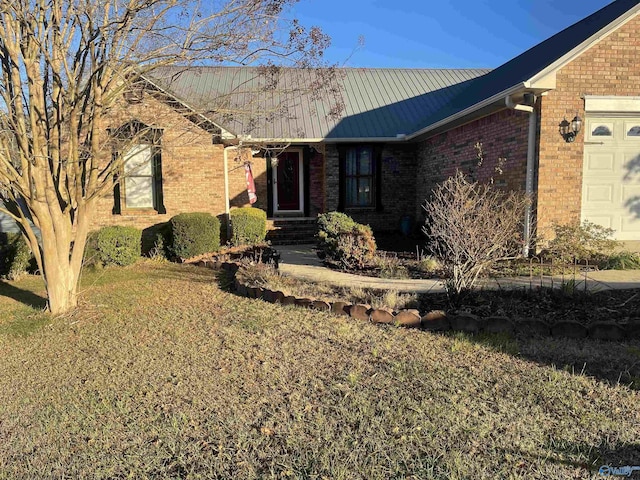 ranch-style home featuring a garage