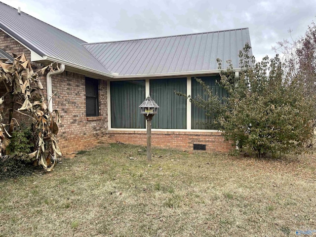 view of property exterior featuring a yard