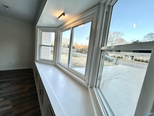 entryway with dark hardwood / wood-style floors