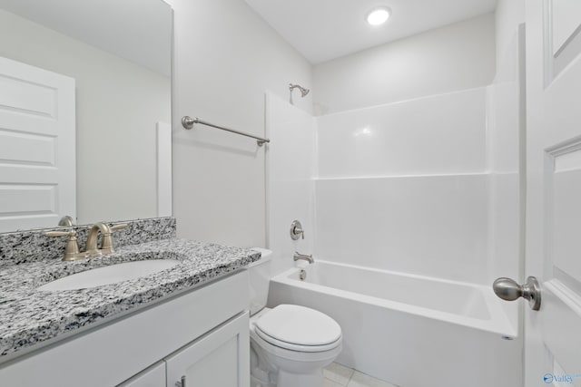 bathroom featuring toilet, tile patterned floors, shower / tub combination, and vanity