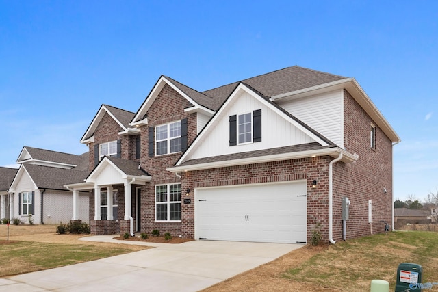 view of front of property with concrete driveway, brick siding, a front lawn, and a shingled roof