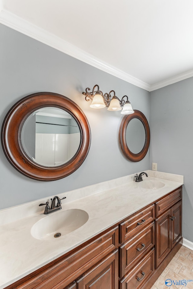 bathroom featuring vanity and ornamental molding