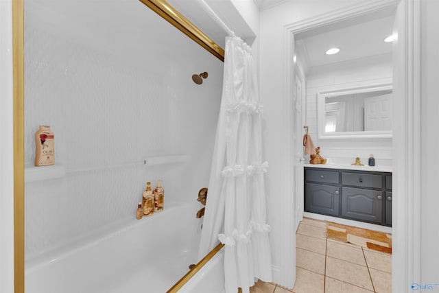 bathroom featuring tile patterned flooring, vanity, and shower / bath combo