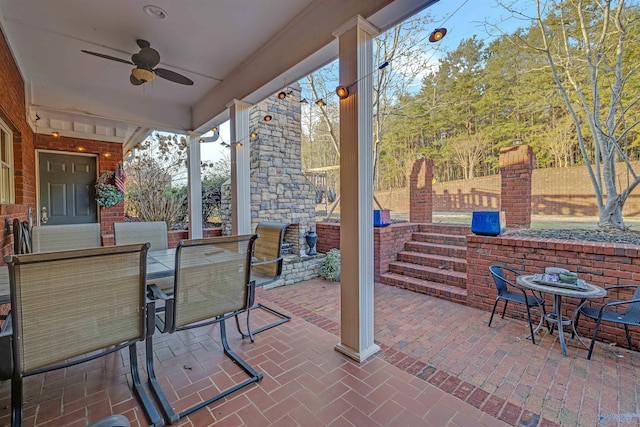 view of patio / terrace featuring ceiling fan