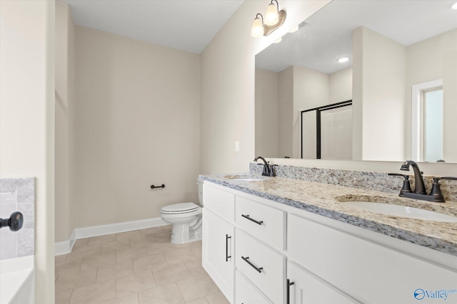 bathroom featuring tile patterned flooring, vanity, an enclosed shower, and toilet