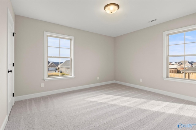 view of carpeted spare room