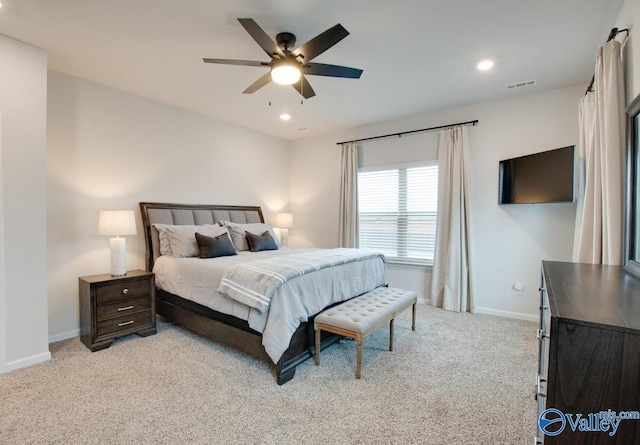 carpeted bedroom with ceiling fan