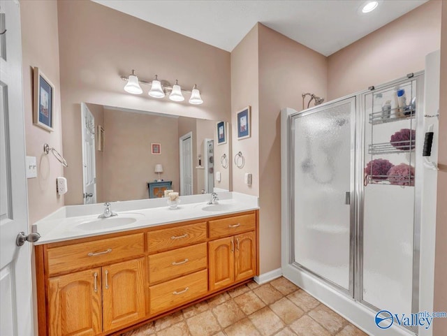 304 Santana Dr, Athens, AL 35611 - bathroom with a stall shower and double vanity