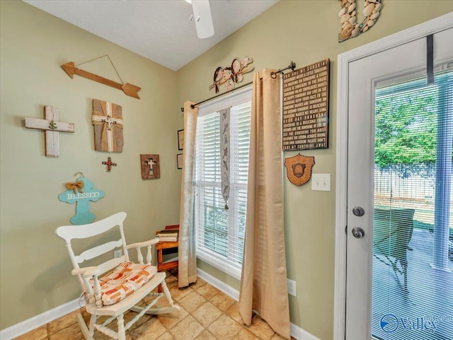 304 Santana Dr, Athens, AL 35611 - doorway to outside featuring baseboards and ceiling fan