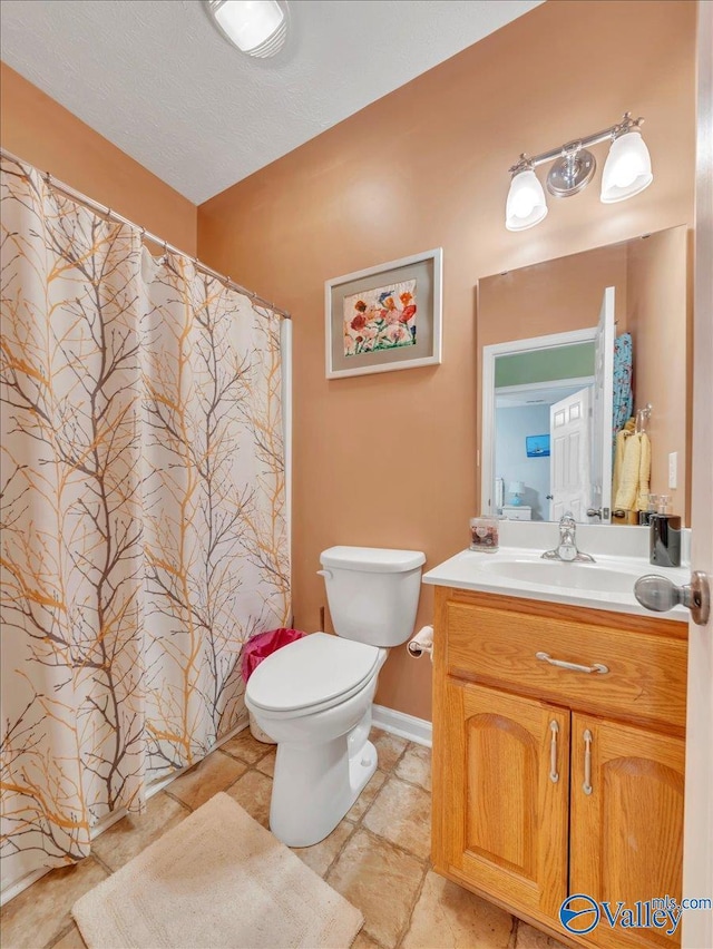304 Santana Dr, Athens, AL 35611 - full bathroom with vanity, toilet, and a shower with curtain