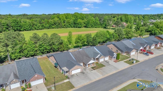 304 Santana Dr, Athens, AL 35611 - aerial perspective of suburban area featuring a heavily wooded area
