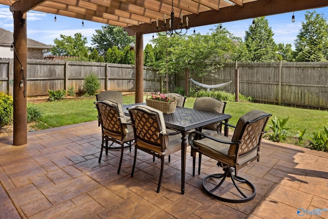view of patio / terrace featuring a pergola and outdoor dining area