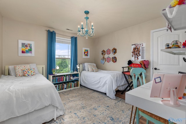 bedroom with a chandelier