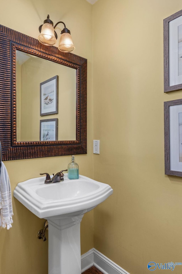 bathroom featuring baseboards