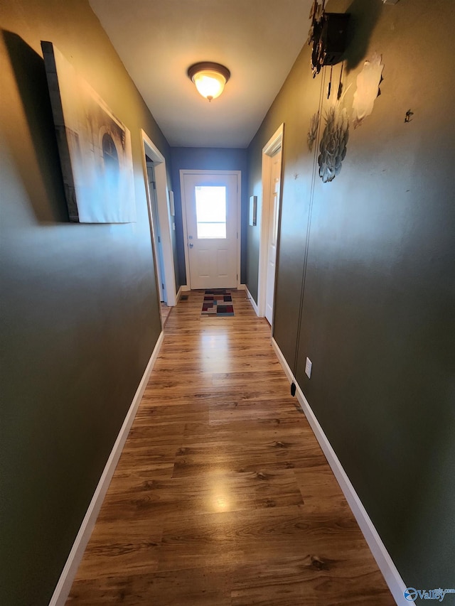 doorway featuring dark hardwood / wood-style floors